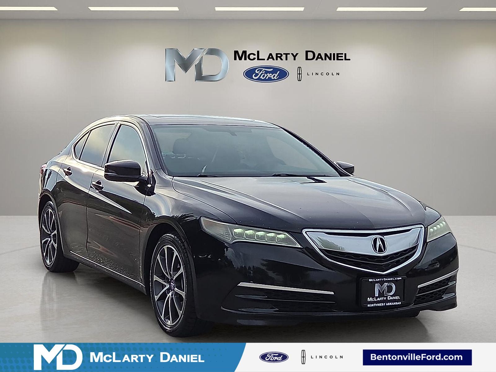 2015 Acura TLX V6 in Black — front three-quarter view