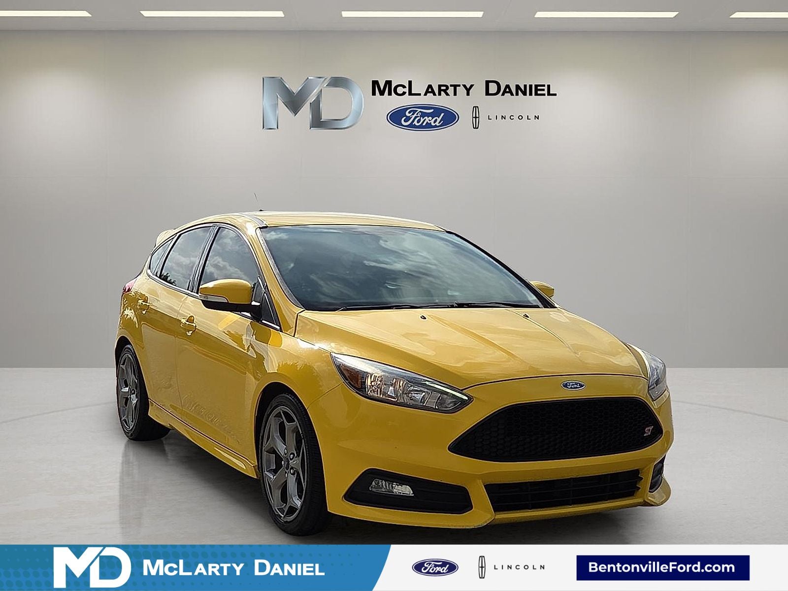 2018 Ford Focus ST in Triple Yellow Tri-Coat — front three-quarter view