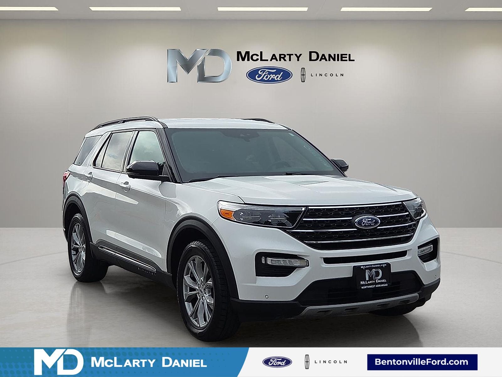 2023 Ford Explorer XLT in White Metallic — front three-quarter view