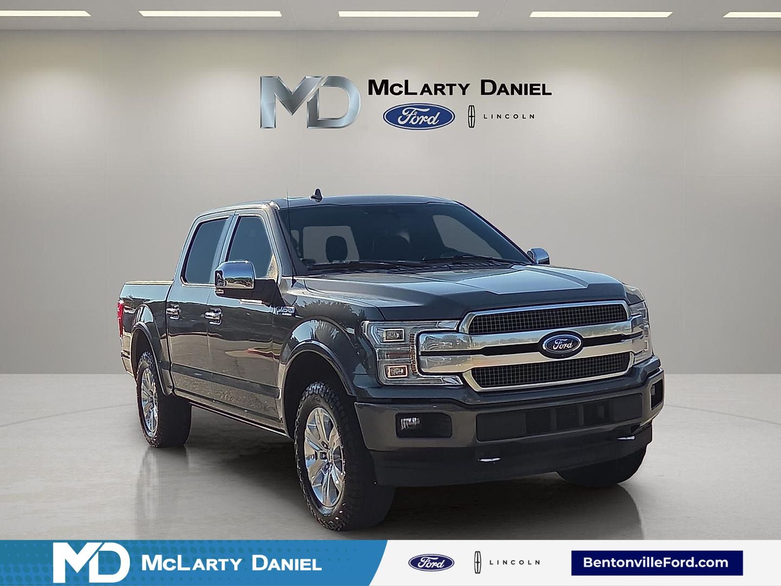 2018 Ford F-150 Platinum in Magnetic Metallic — front three-quarter view