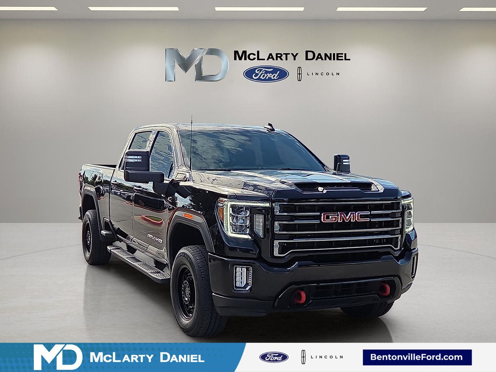 2022 GMC Sierra 2500HD AT4 in Onyx Black — front three-quarter view