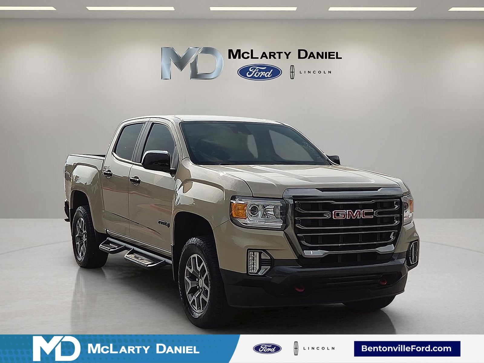 2022 GMC Canyon AT4 w/Leather in Desert Sand Metallic — front three-quarter view