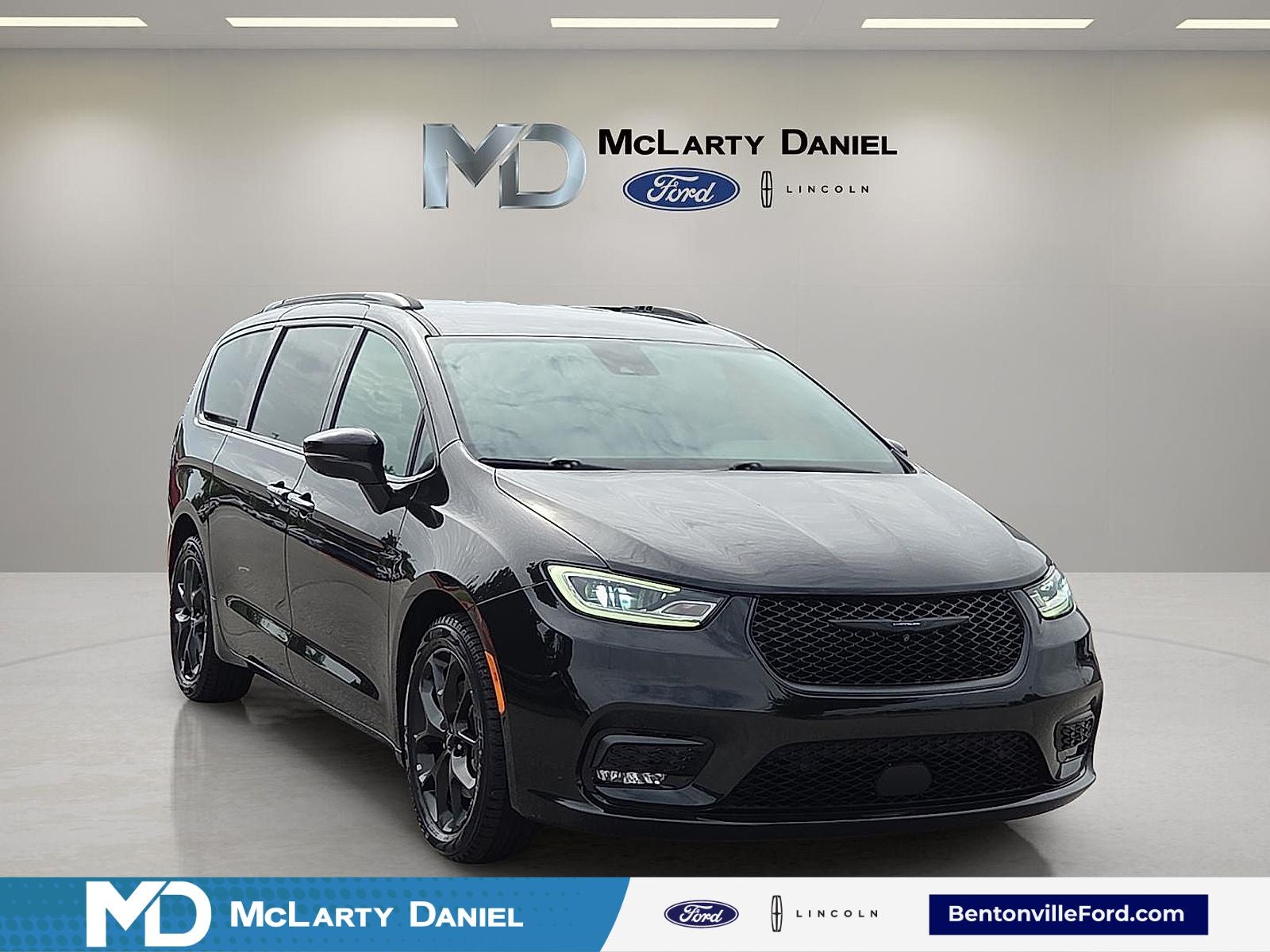 2023 Chrysler Pacifica Touring L in Brilliant Black Crystal Pearlcoat — front three-quarter view