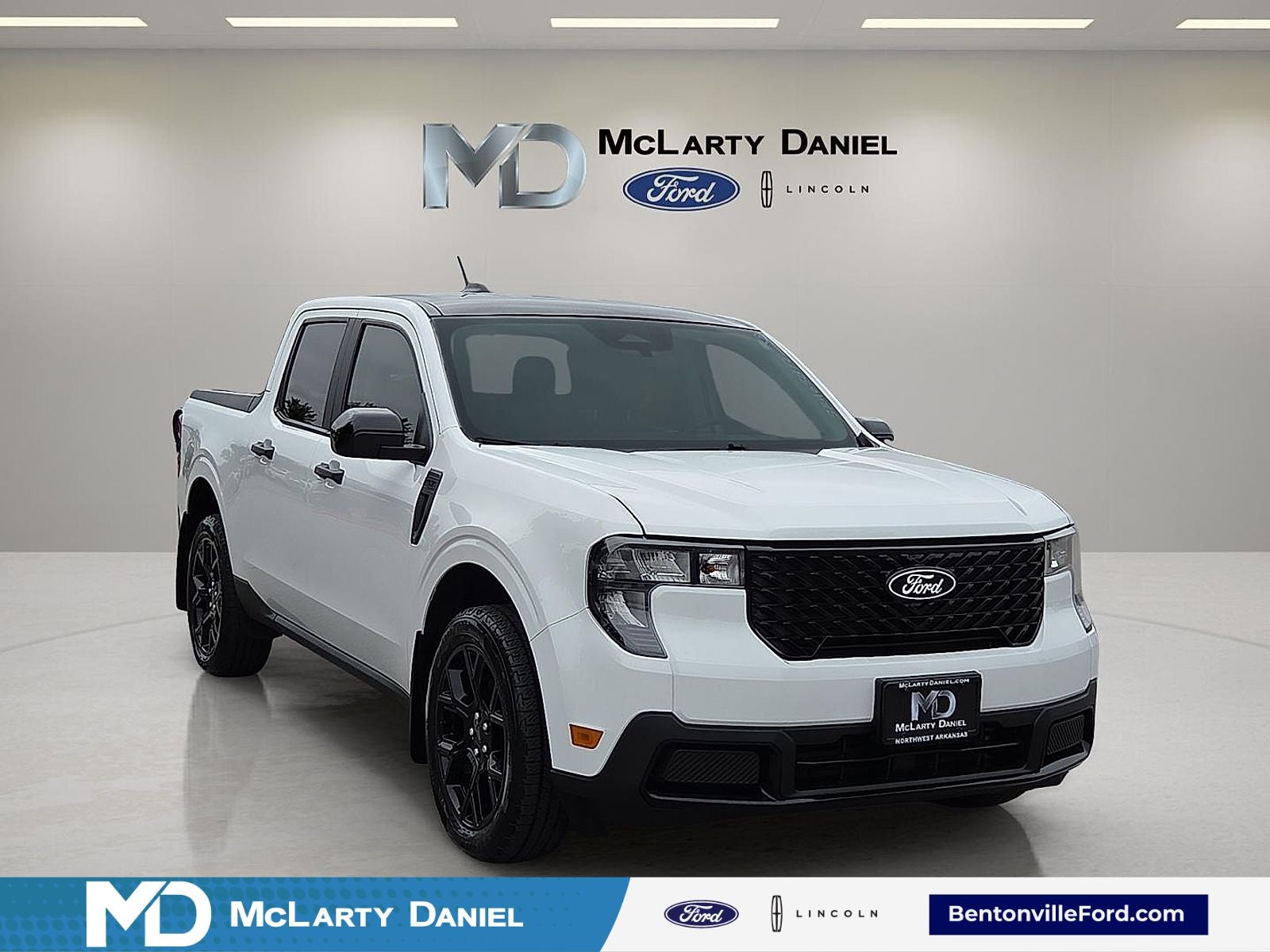 2025 Ford Maverick XLT in Oxford White — front three-quarter view