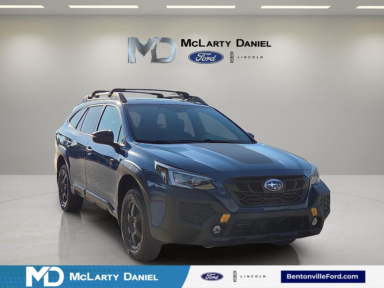 2024 Subaru Outback Wilderness in Geyser Blue — front three-quarter view