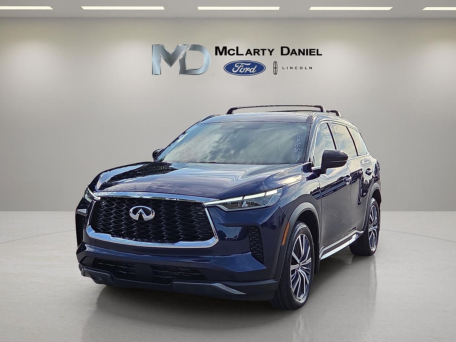 2025 INFINITI QX60 — side profile view