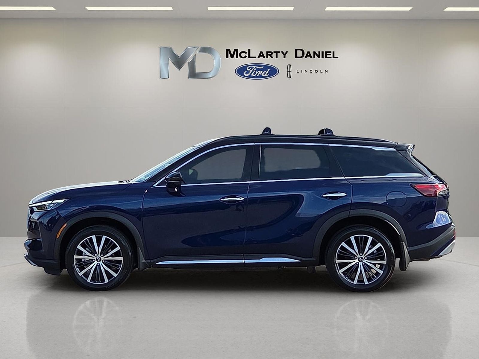 2025 INFINITI QX60 — rear three-quarter view
